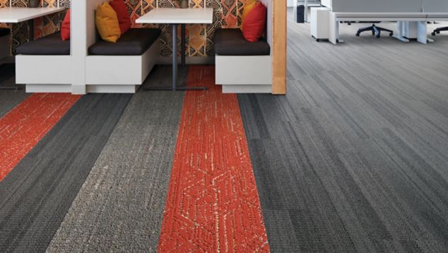 Interface Stitchery, Static LInes, and Circuit Board plank carpet tile in meeting area with booths