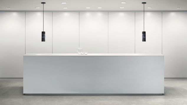 Interface Textured Stones LVT in reception area with white desk