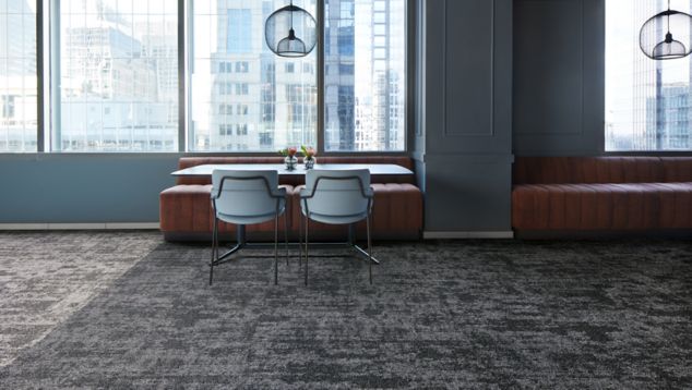 Interface Stunt Double carpet tile in dining area with table and chairs