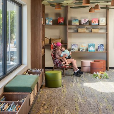 Interface Stipplied Hues plank carpet tile in community library