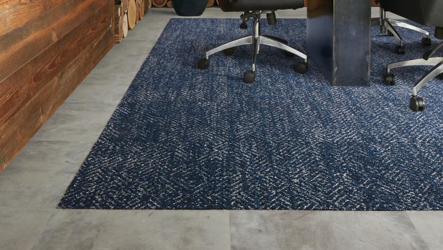 Interface Third Space 309 carpet tile with Textured Stones LVT in meeting room