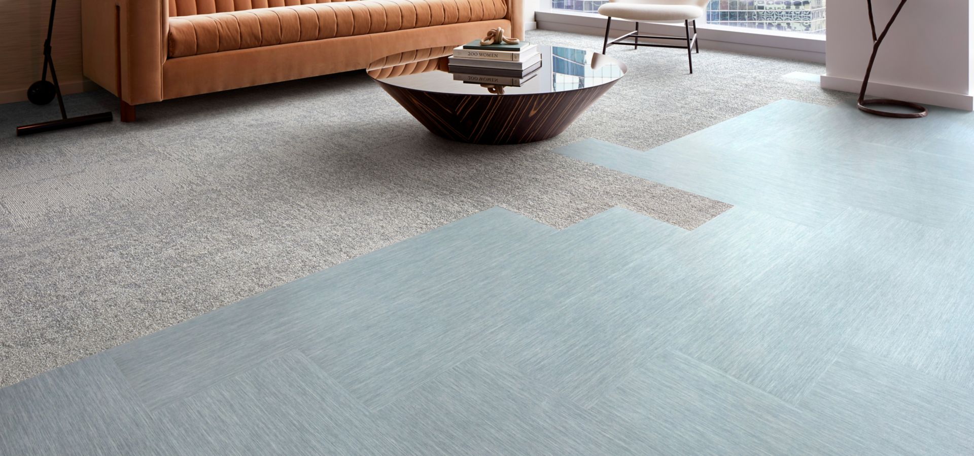 Interface Tokyo Texture carpet tile and Brushed Lines LVT in seating area with couch