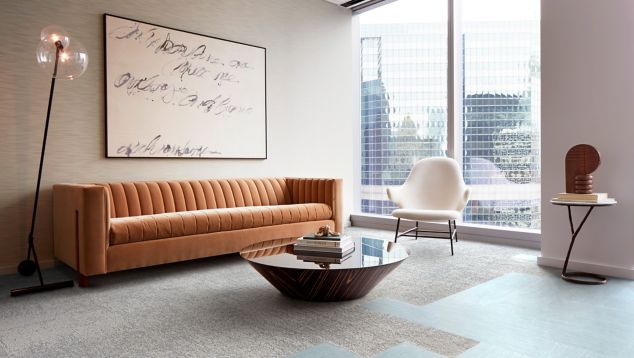 Interface Tokyo Texture carpet tile and Brushed Lines LVT in seating area with couch