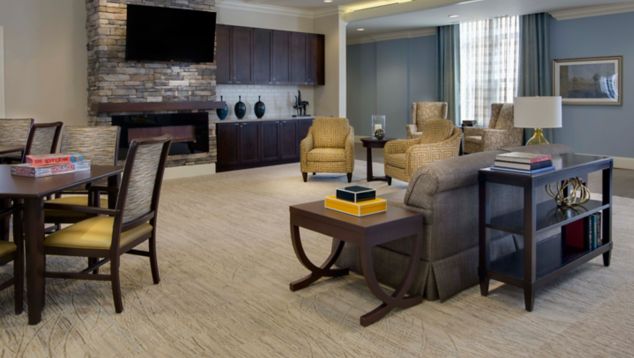 Interface Prairie Grass carpet tile in common room