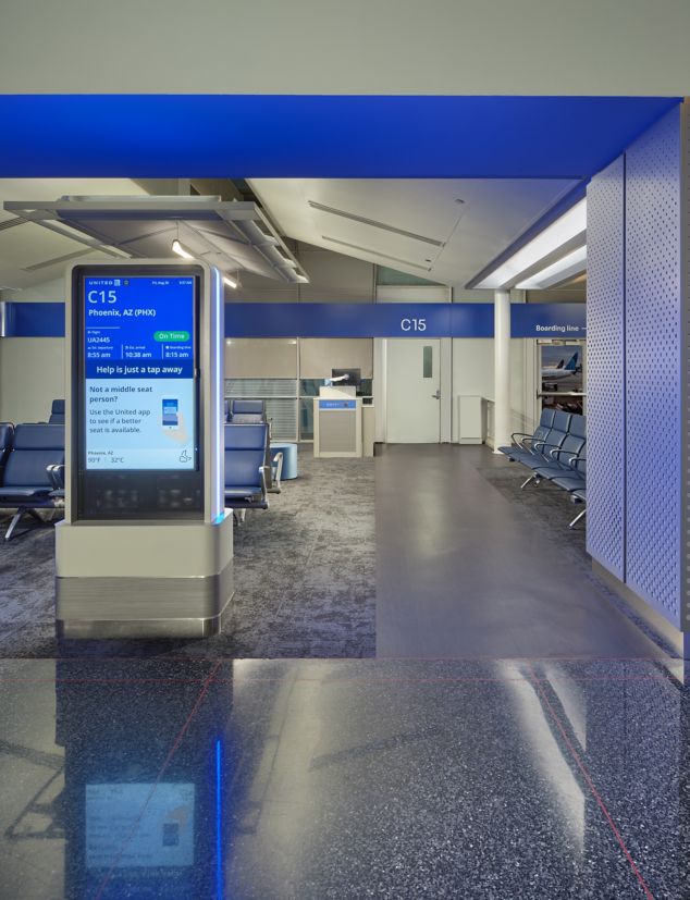 Interface B603 carpet tile and Brushed Links plank LVT in urban airport terminal
