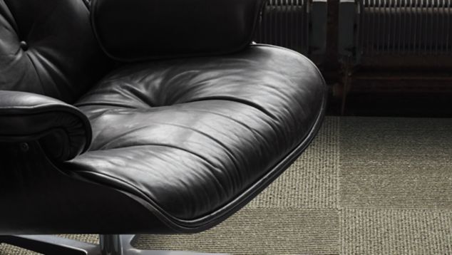 Interface UR203 carpet tile in a close up with leather chair