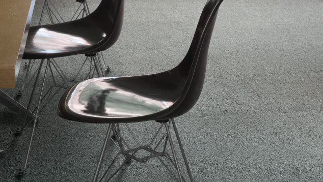 Interface UR302 carpet tile in close up with chairs