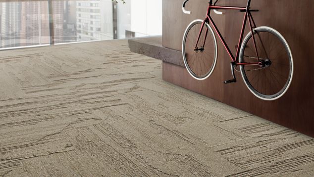 Interface UR501 plank carpet tile in office common area with bike 