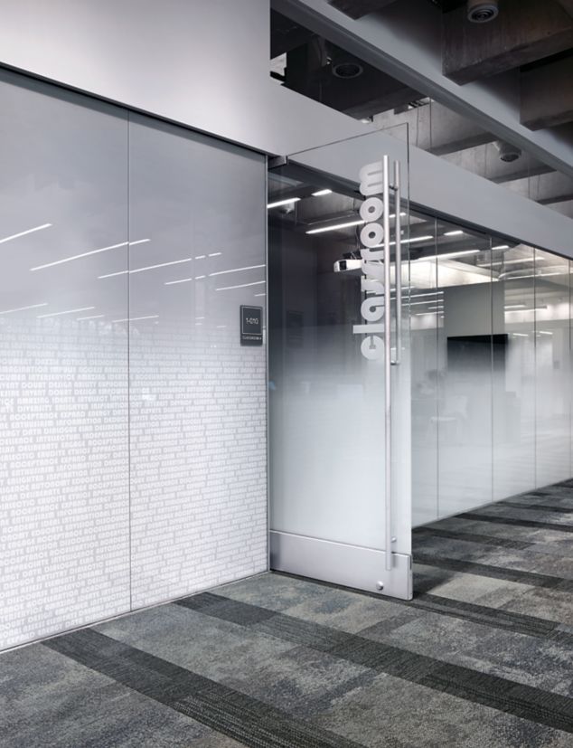 Interface Exposed and Verticals carpet tiles outside of frosted glass office at Meridian