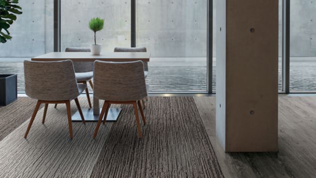 Interface WW880 plank carpet tile and Natural Woodgrains LVT in office common area