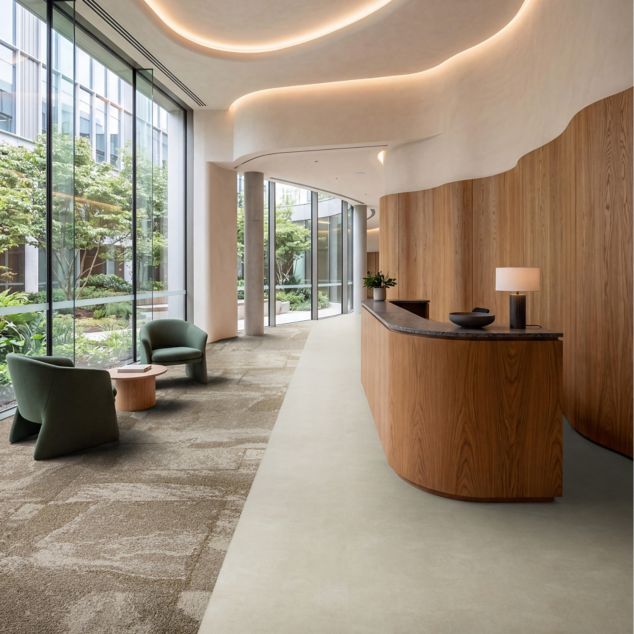 Interface Waypoint carpet tile with Hearth plank LVT in workplace lobby