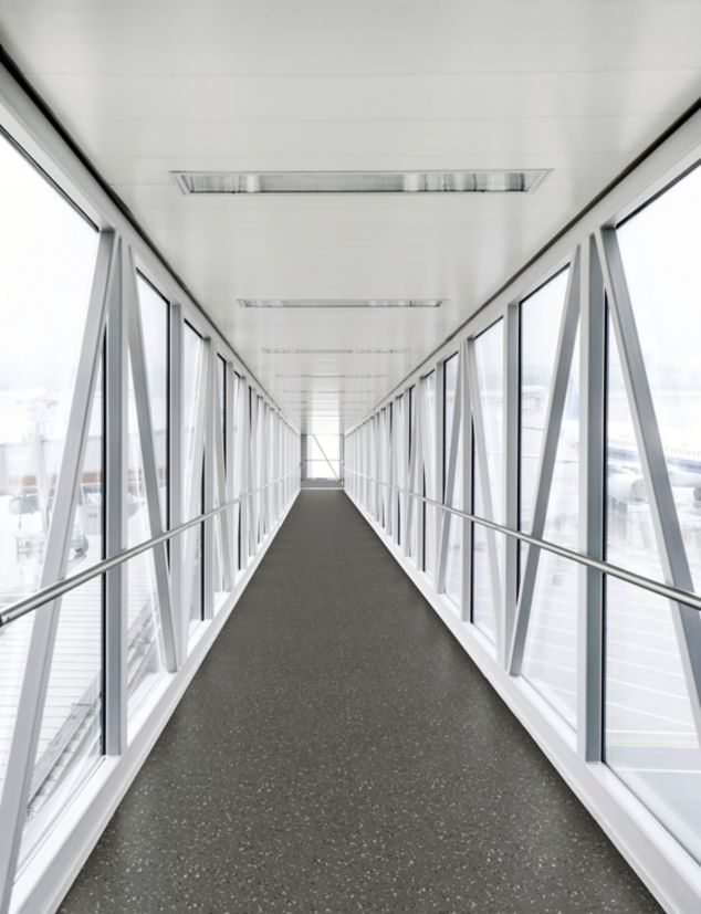 norament xp grano rubber flooring in corridor/walkway