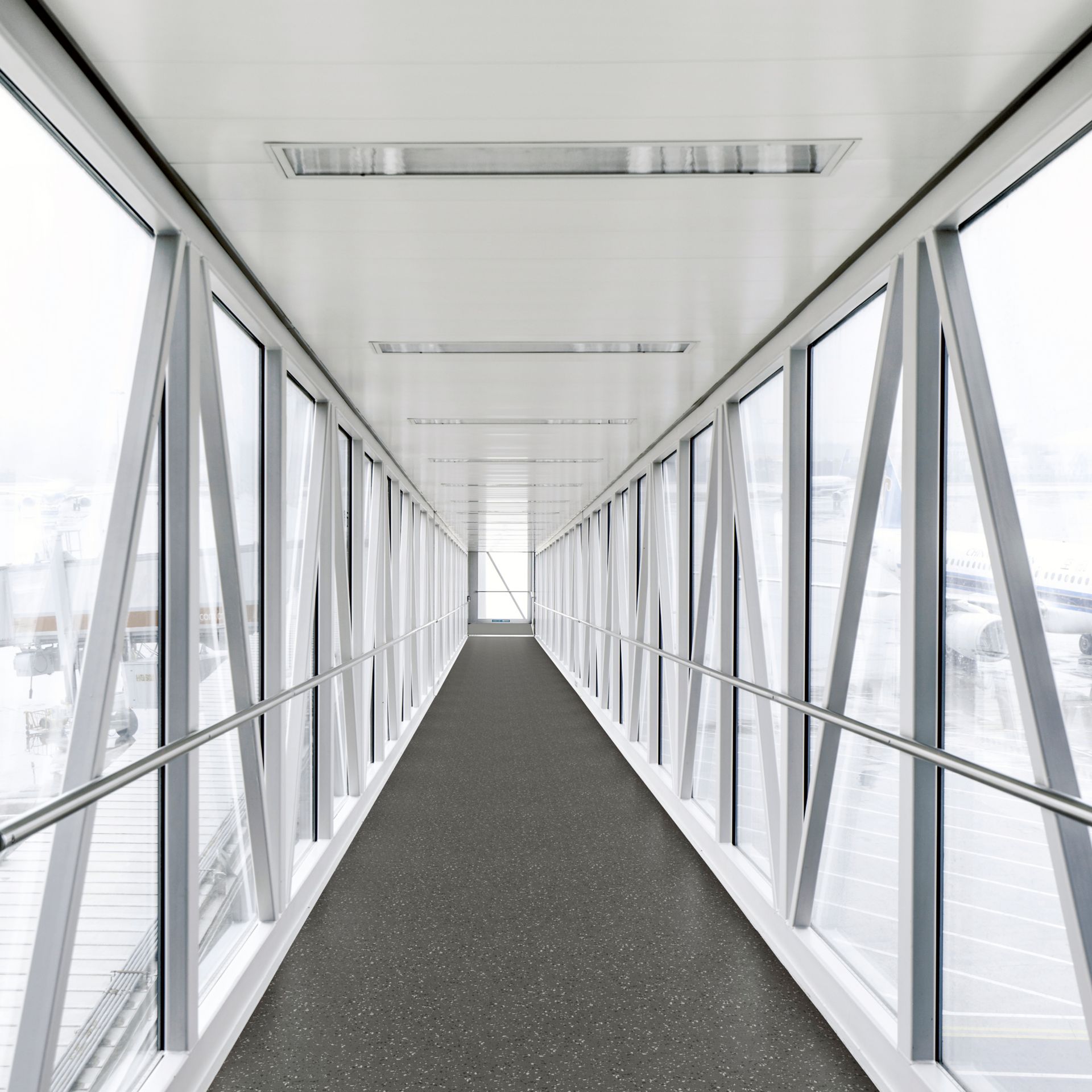 norament xp grano rubber flooring in corridor/walkway