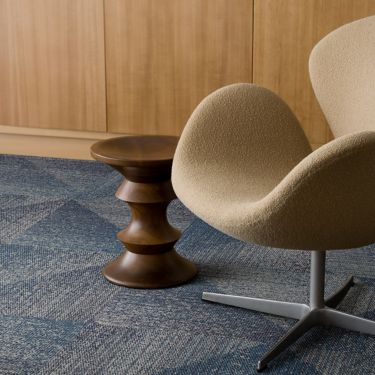 Interface Light Play carpet tile in open workspace area with seating