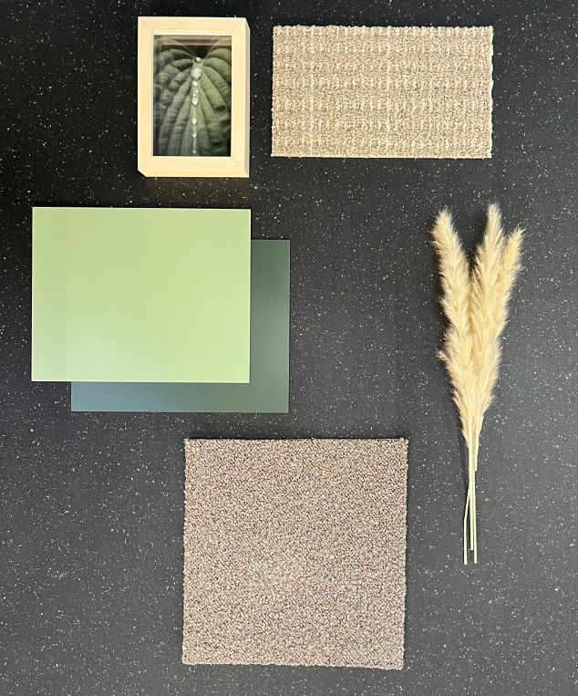 nora rubber tiles with carpet rectangle, wheat, and framed plant over black rubber background