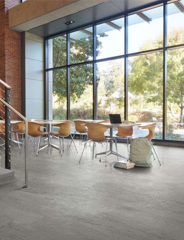 norament 926 arago Rubber Flooring in open space with tables and chairs