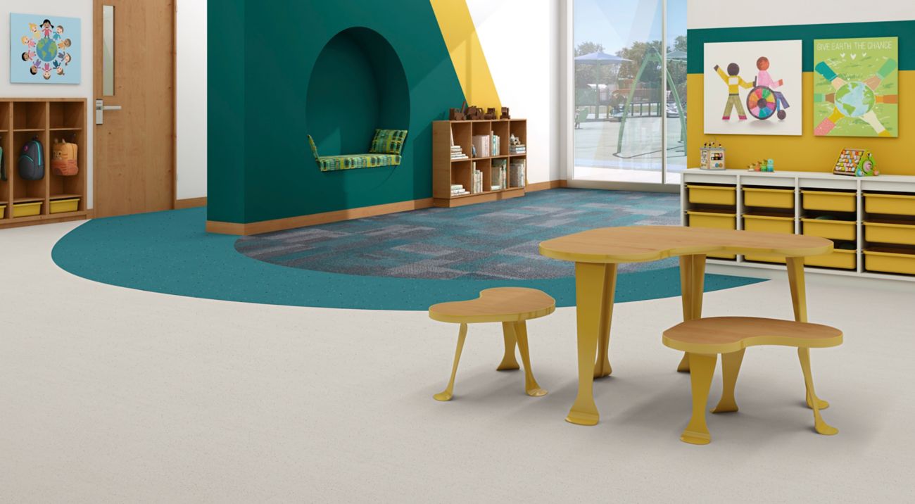 norament kivo rubber flooring with Interface The Standard carpet tile in K-12 classroom