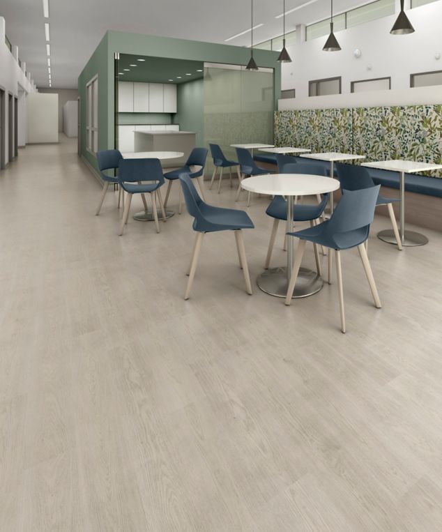 noravant timber rubber flooring in lobby with dining chairs