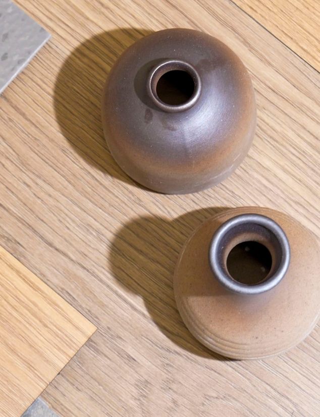 Decorative pots on samples of noravant timber rubber flooring
