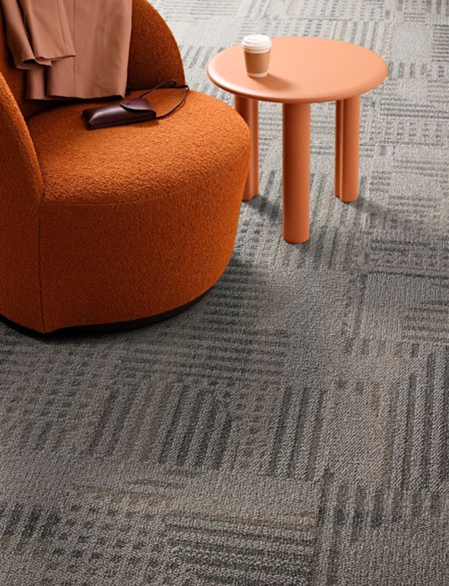Interface Hop to It carpet tile in seating area