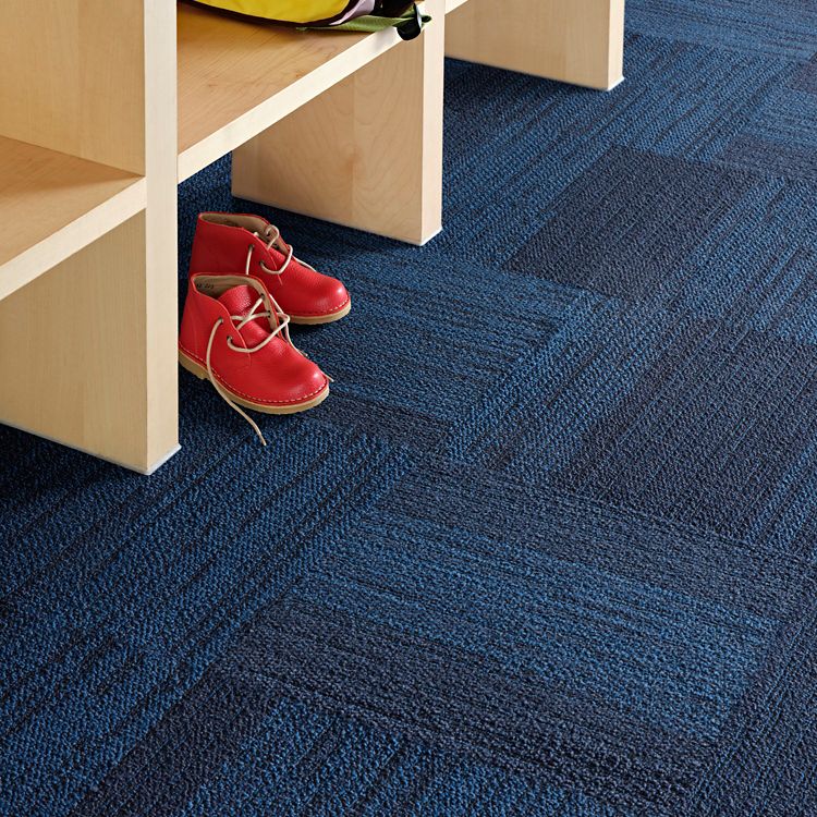 Interface Out of Bounds carpet tile in Kindergarten cubby area