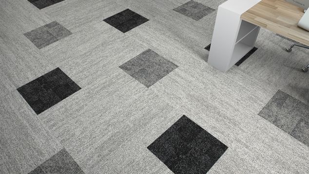 Interface Open Air 402 plank carpet tile in floor view with small workstation off to the right