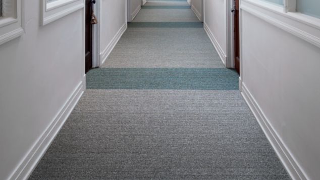 Interface WW860 and WW865 plank carpet tile in a building corridor