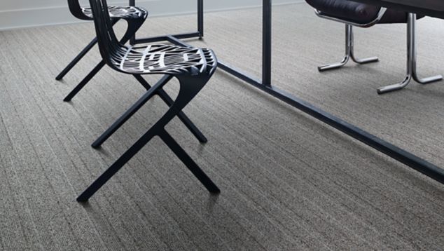 Interface WW860 plank carpet tile in work area with table and chairs