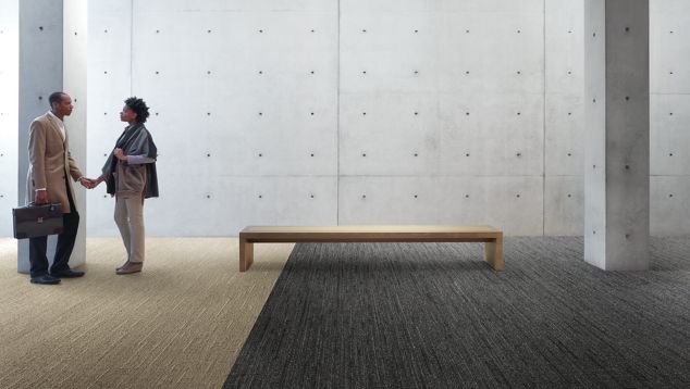 Interface WW870 plank carpet tile in open lobby area with bench